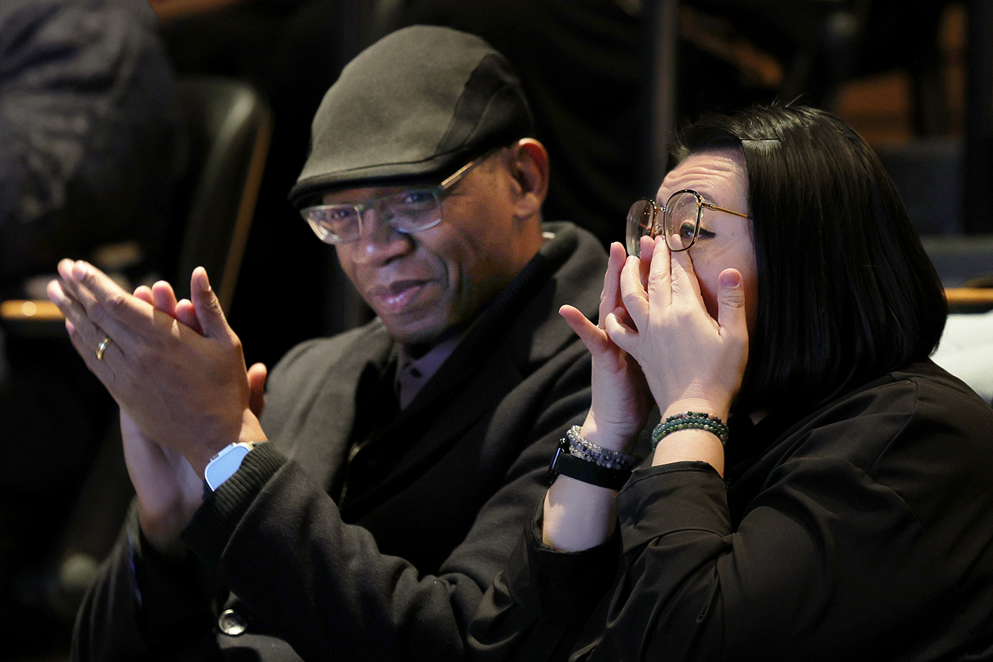 A couple reacts to the 'fireside chat' featuring MLK granddaughter Yolanda King, who came to Richard Celeste Theatre to answer questions from a panel of area students. Photo by Jamie Cotten / Colorado College