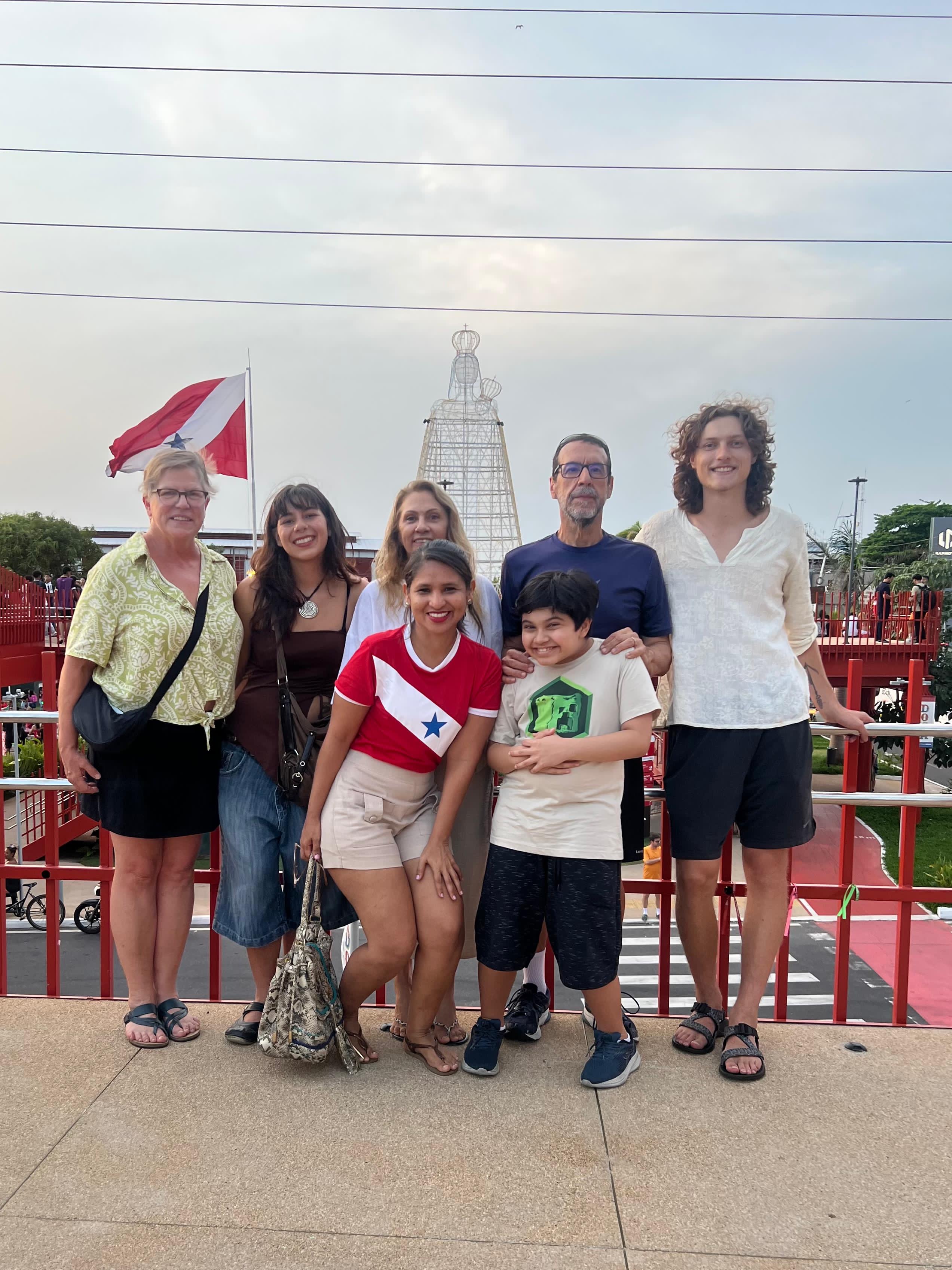 Riss Banuelos '27, Noah Furuseth ’26, and Dr. Sarah Hautzinger in Brazil with the family who owns the flat the team stayed in. Photo provided by Furuseth.