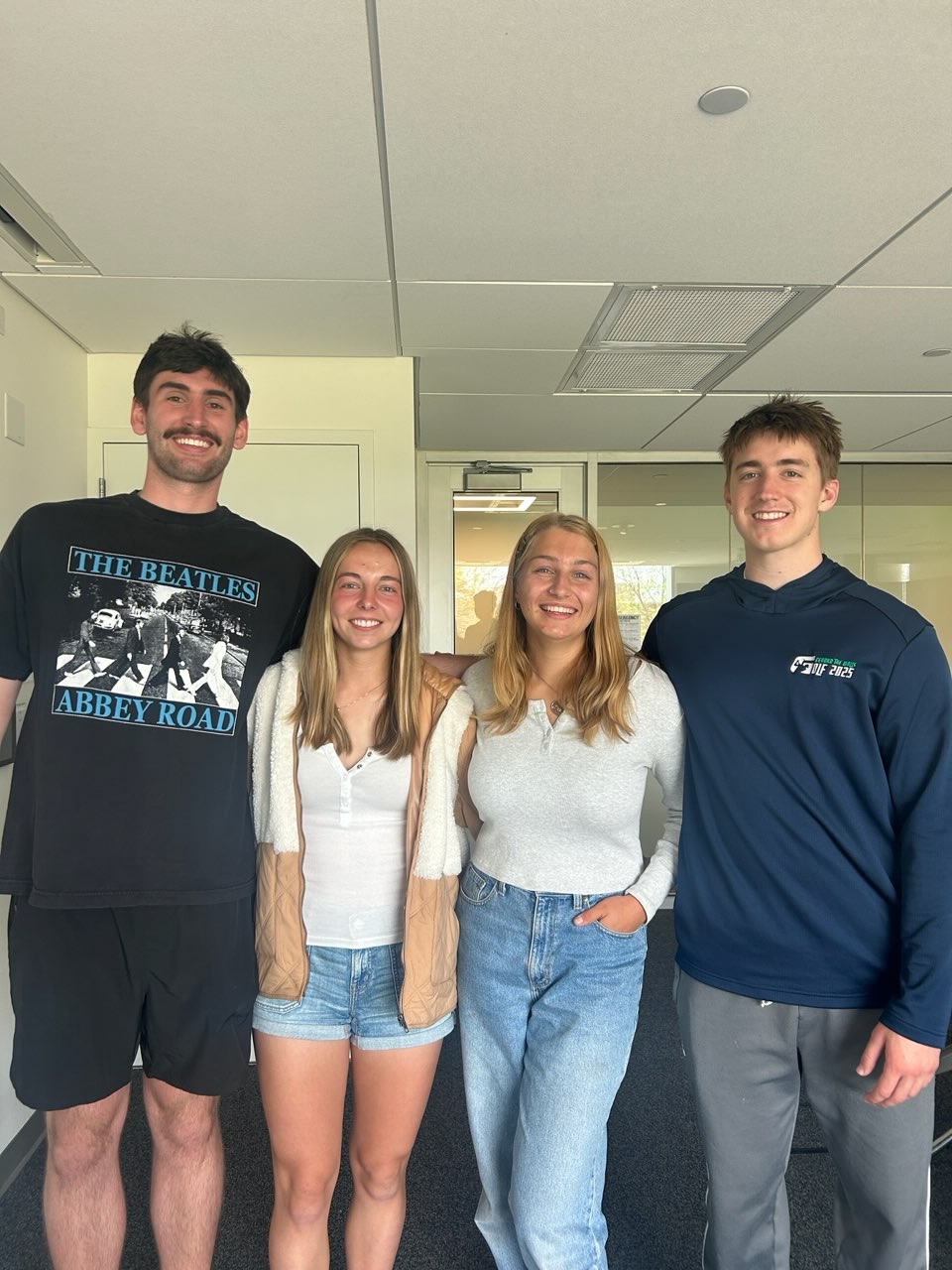 (L to R) Kyle Kihlberg ’29, Skye Pratt ’29, Abigail Hill ’29, and Nick Brashear ’29 at a PeakAssist meeting on April 14, 2026. Photo provided by Kihlberg.