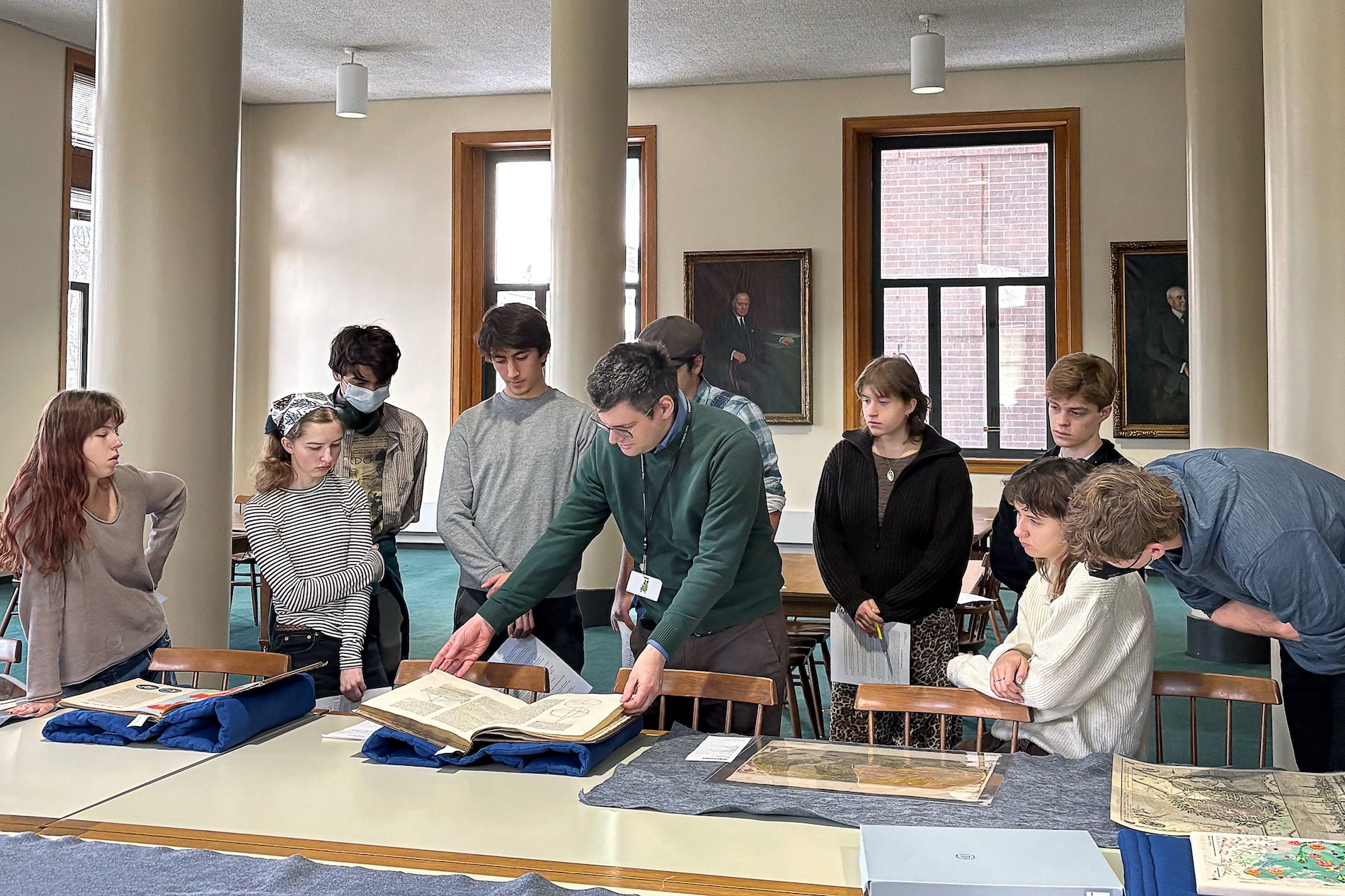 (From left) Zoe Williamson '26, Emma Snow '26, Mohan Raghunath '26, Aden Katz '26, David Weimer, Curator of Maps and Director of the Hermon Dunlap Smith Center for the History of Cartography at the Newberry, Jeremy Jarecki '26, Evan Cote '26, Mila Naumovska '26, and Will Myers '26.