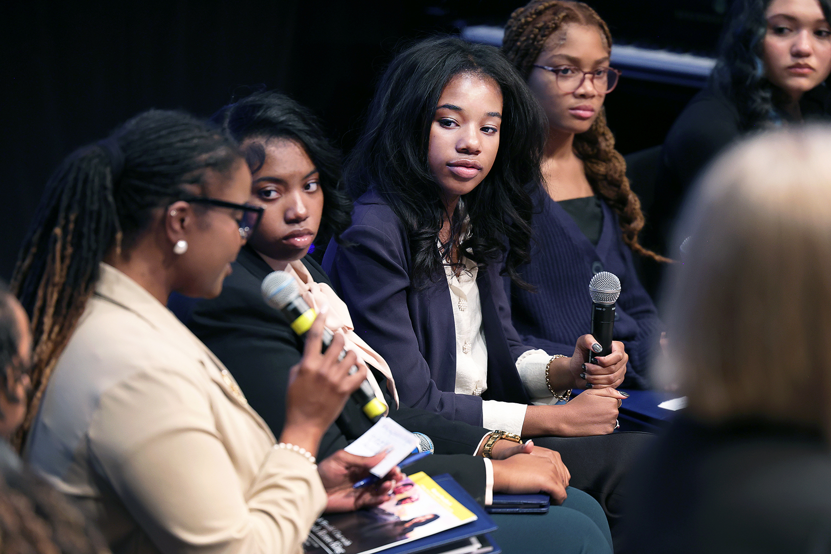 Another student on the panel asks Yolanda King a question about nonviolence at the 'fireside chat' in Celeste Theatre on January 18, 2026. Photo by Jamie Cotten / Colorado College
