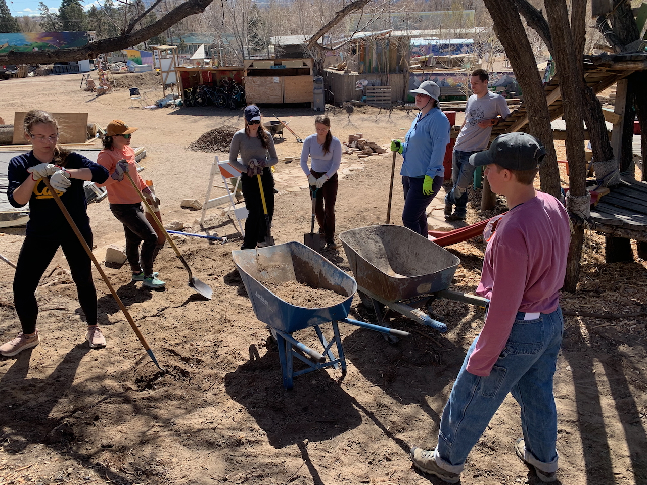 Students in Block 7 2025 Introduction to Earth Systems are pictured doing volunteer work at Concrete Coyote Community Park. They are shoveling the Earth to stabilize slopes, level out trails, and prevent erosion. Photo provided by class instructor and Geology Professor Christine Siddoway.